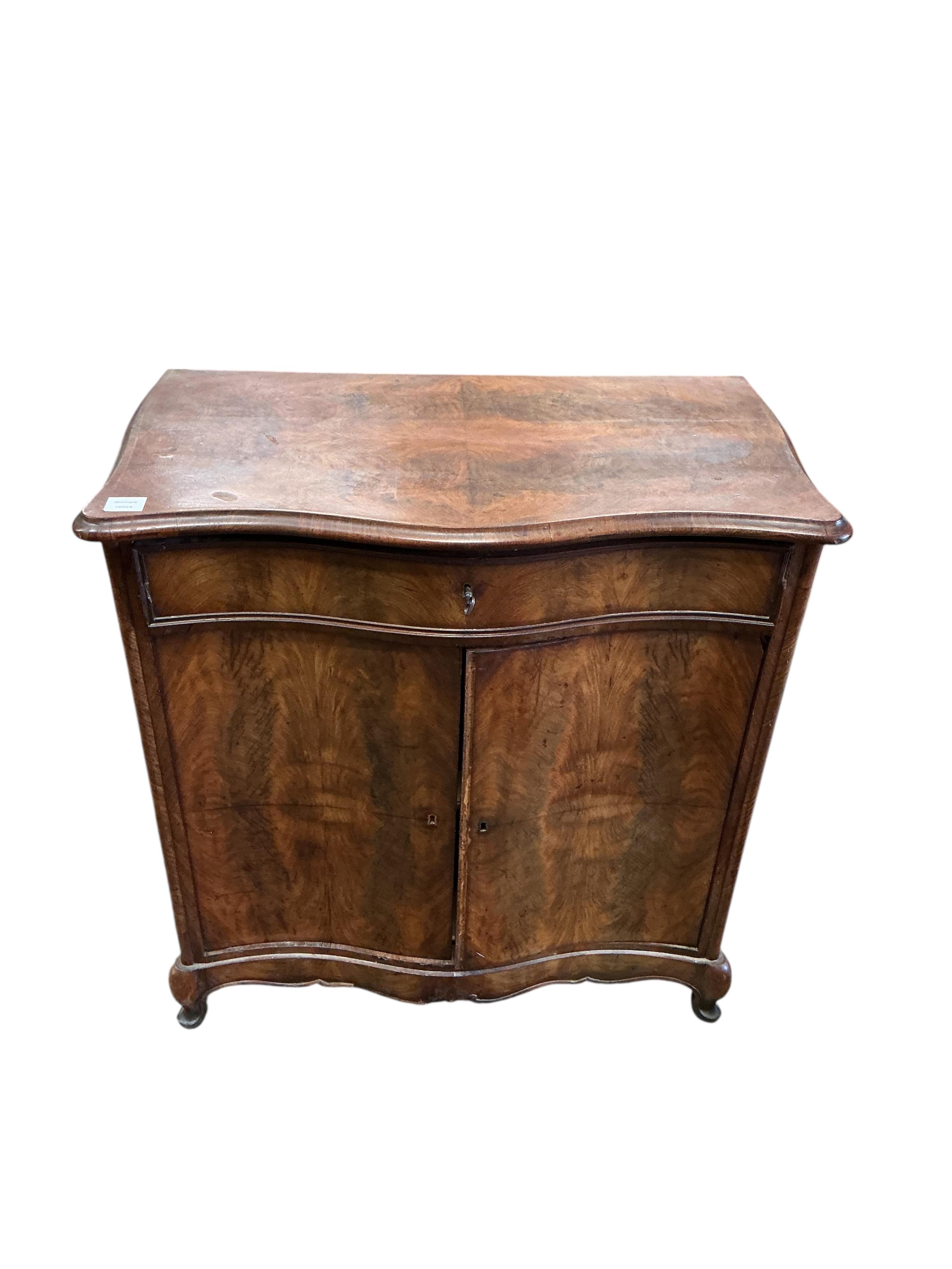 A 19th century French serpentine side cabinet, width 84cm, depth 46cm, height 88cm
